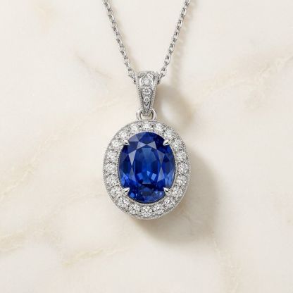 Aurum Vale Liora Sapphire Charm Heirloom front view